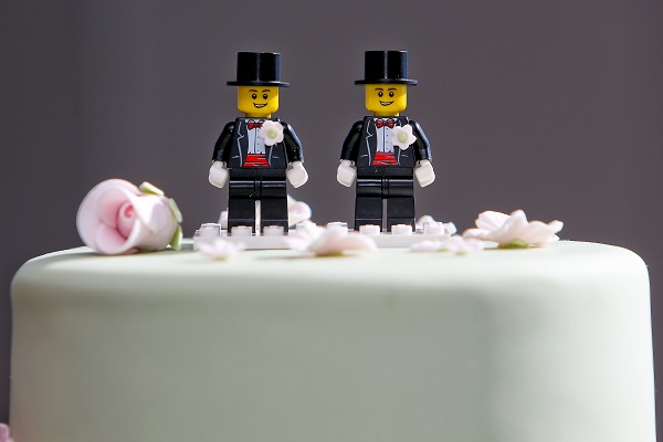 WELLINGTON, NEW ZEALAND - AUGUST 19: Two Lego men decorate the top of Paul McCarthy and Trent Kandler's wedding cake prior to the reception at Martin Bosley's on August 19, 2013 in Wellington, New Zealand. Australian gay couple Paul McCarthy and Trent Kandler were flown to Wellington by Tourism New Zealand in a promotion to highlight to Australians that same-sex marriage is legal in New Zealand. (Photo by Hagen Hopkins/Getty Images)